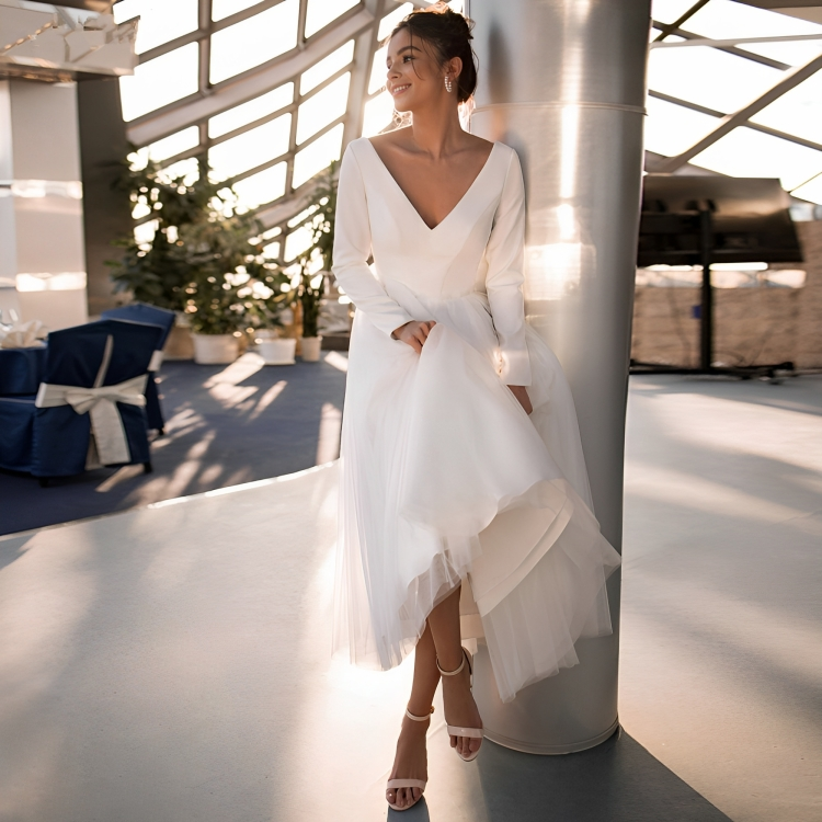 Tea-Length Elegance with Long Sleeves in the White Bridal Dress