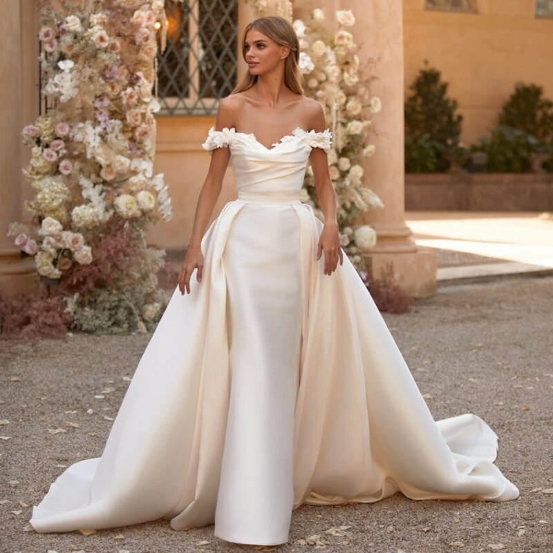 off-shoulder mermaid wedding dress with a detachable skirt